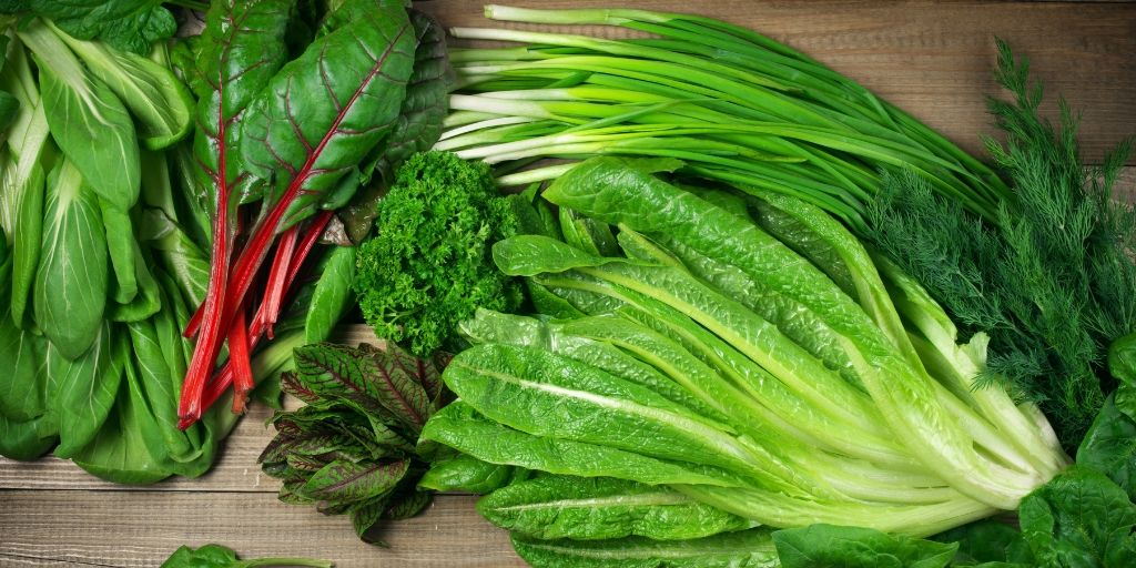 eating green leafy vegetables